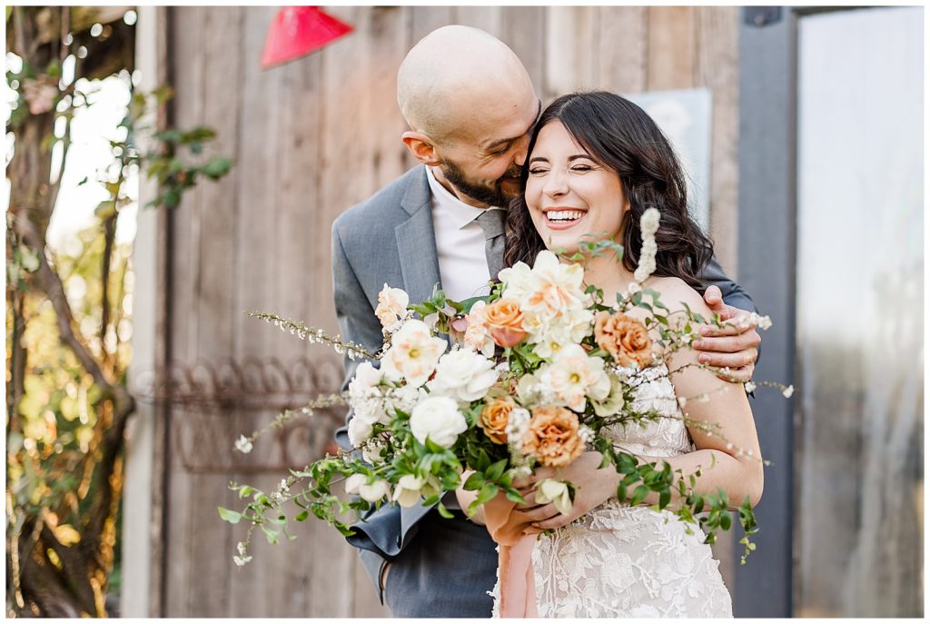 Five Oaks Farm Wedding bride and groom portrait with florals