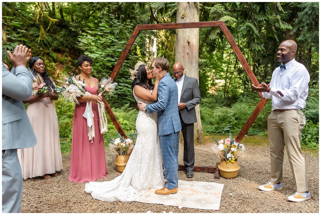 Hornings Hideout wedding ceremony bride and groom kiss