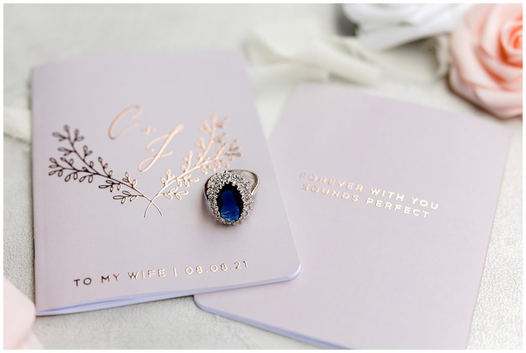 Hornings Hideout wedding ring on vow books
